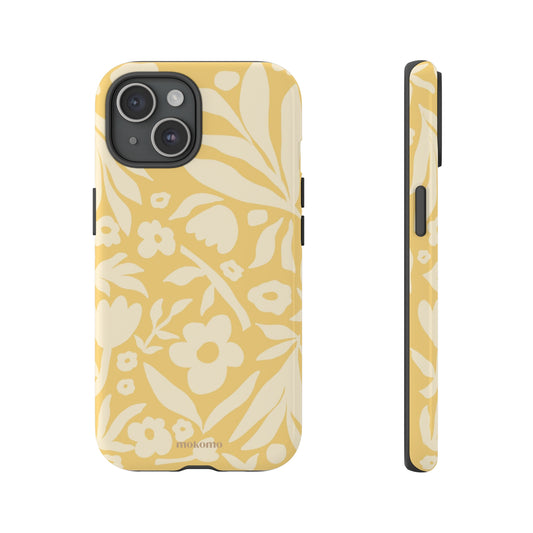 White floral design on an iPhone case with a yellow background 