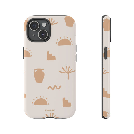 Phone case with a Moroccan design that’s brown and white in colour  